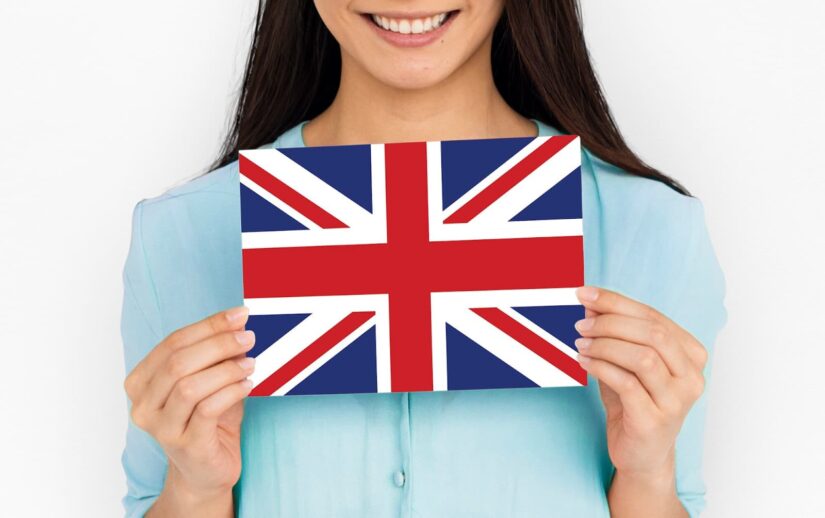 Woman holding UK flag